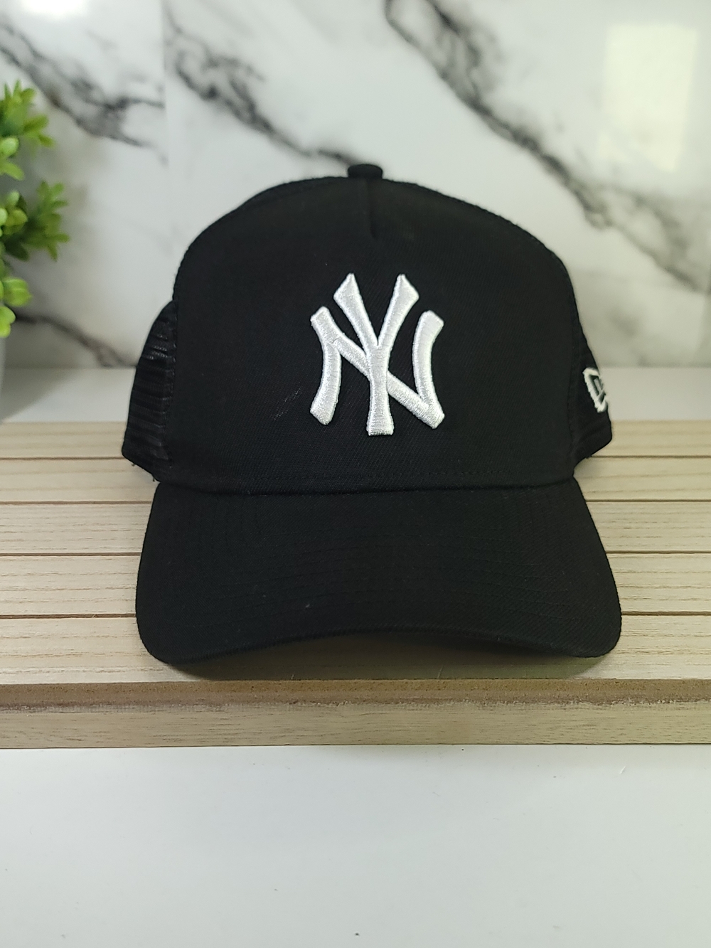 New York Yankees Black Trucker Cap with White Logo. New Era Adjustable